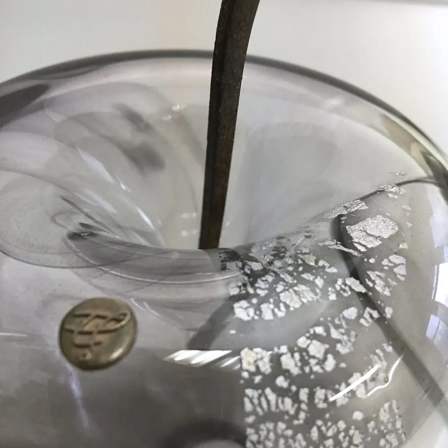 A Happy Apple glass sculpture