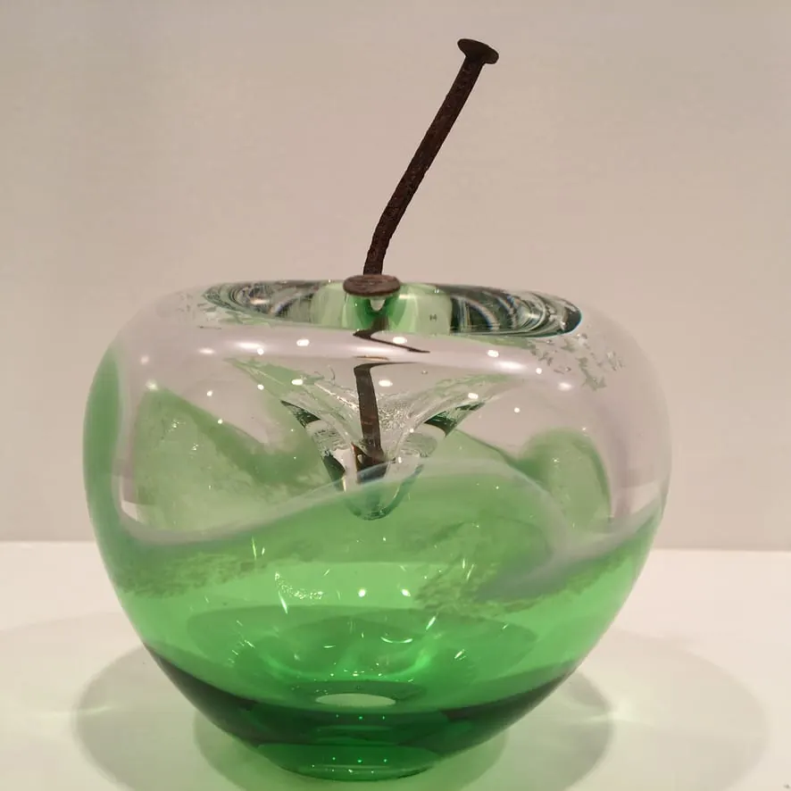 A Happy Apple glass sculpture