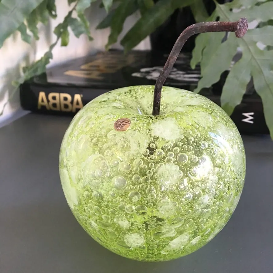 A Happy Apple glass sculpture