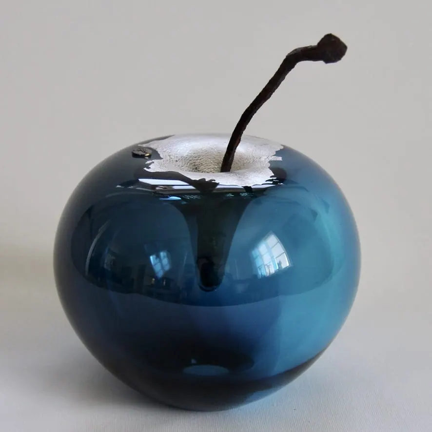 A Happy Apple glass sculpture