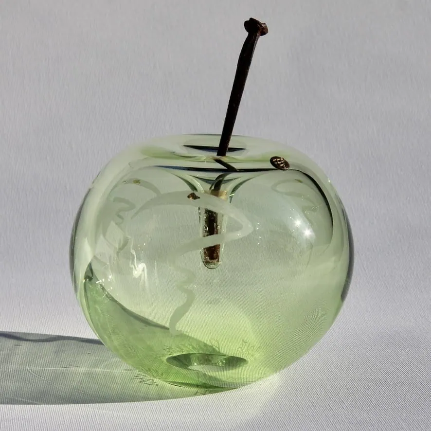 A Happy Apple glass sculpture