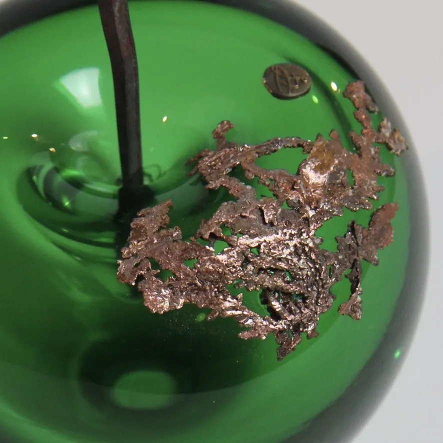 A Happy Apple glass sculpture