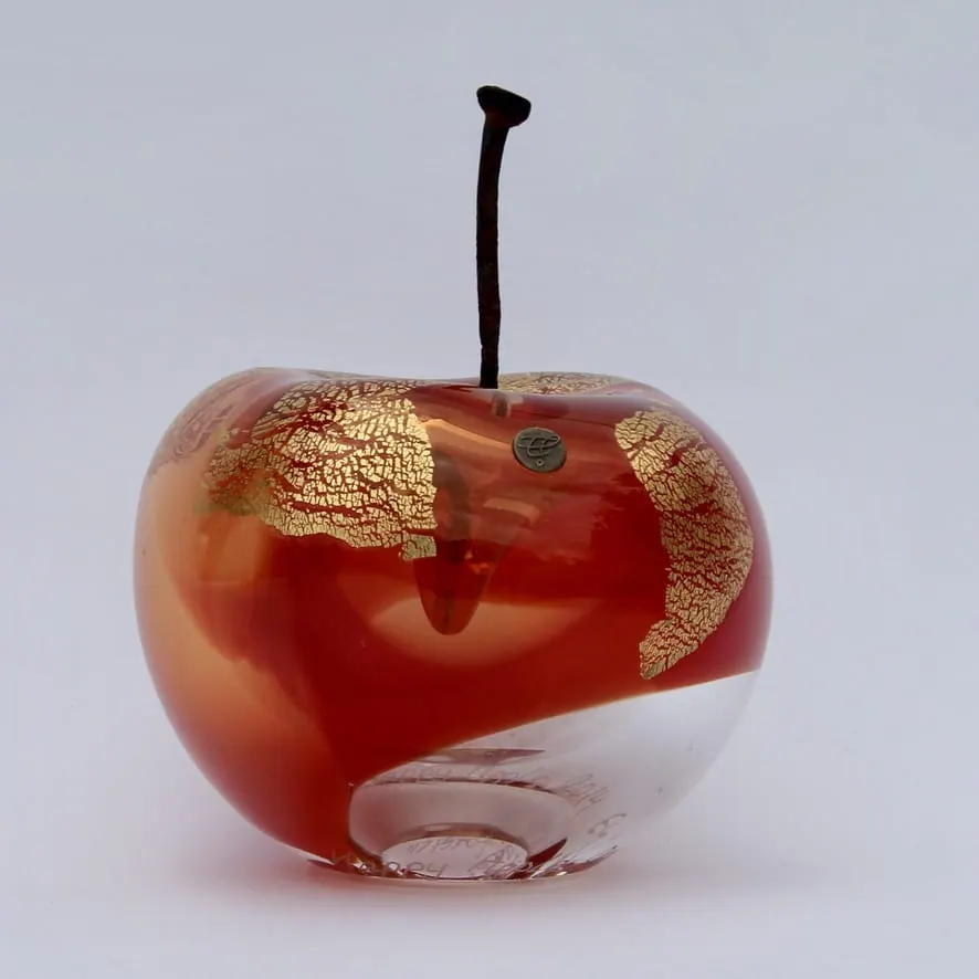 A Happy Apple glass sculpture