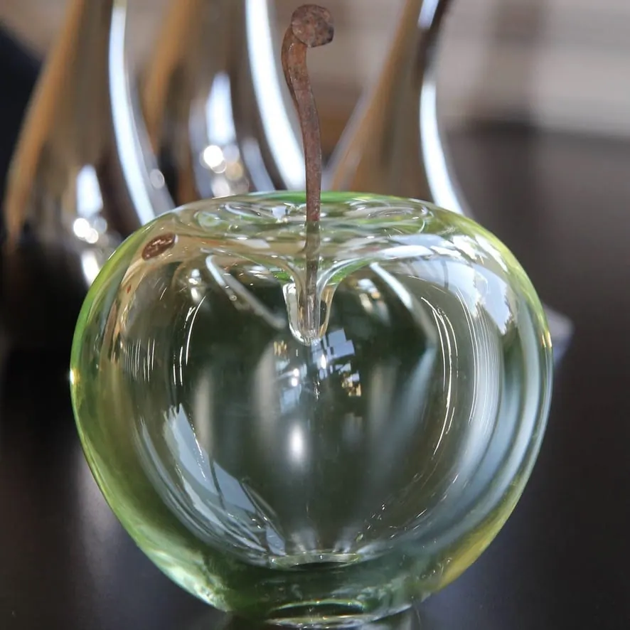 A Happy Apple glass sculpture