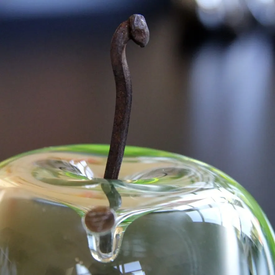A Happy Apple glass sculpture