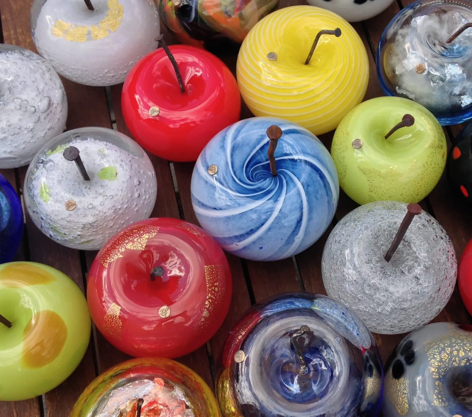 A Happy Apple glass sculpture