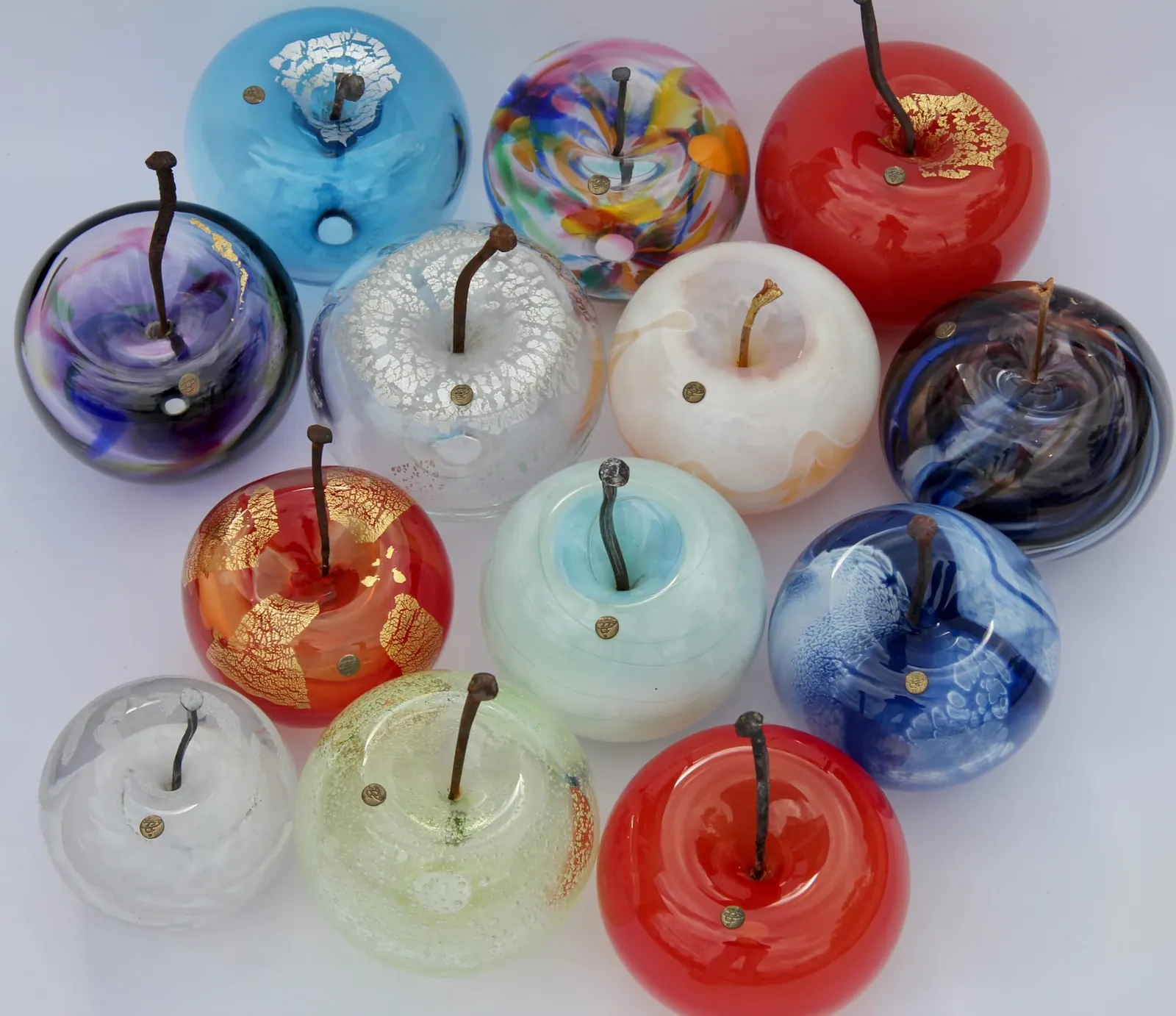 A Happy Apple glass sculpture