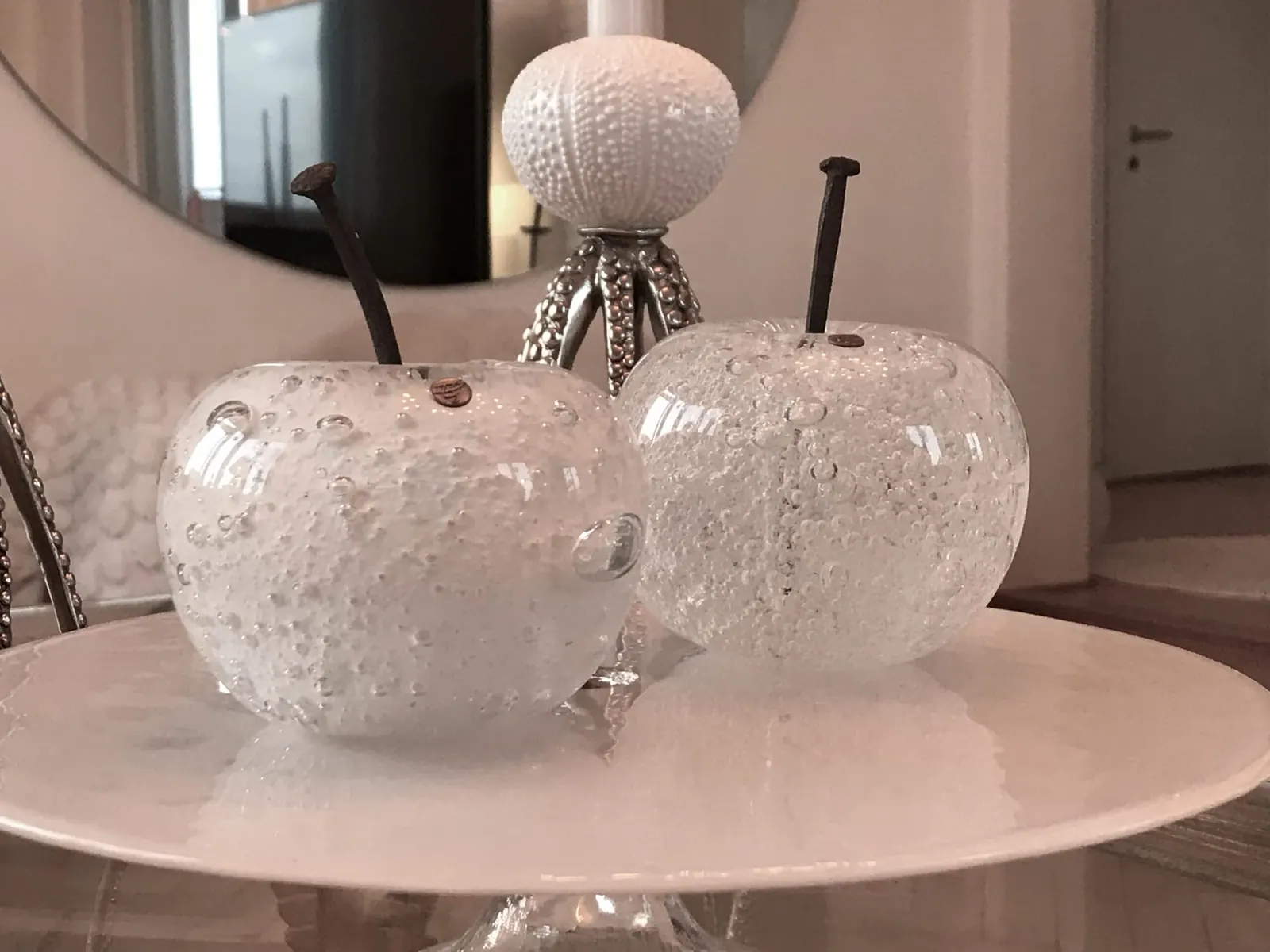 A Happy Apple glass sculpture