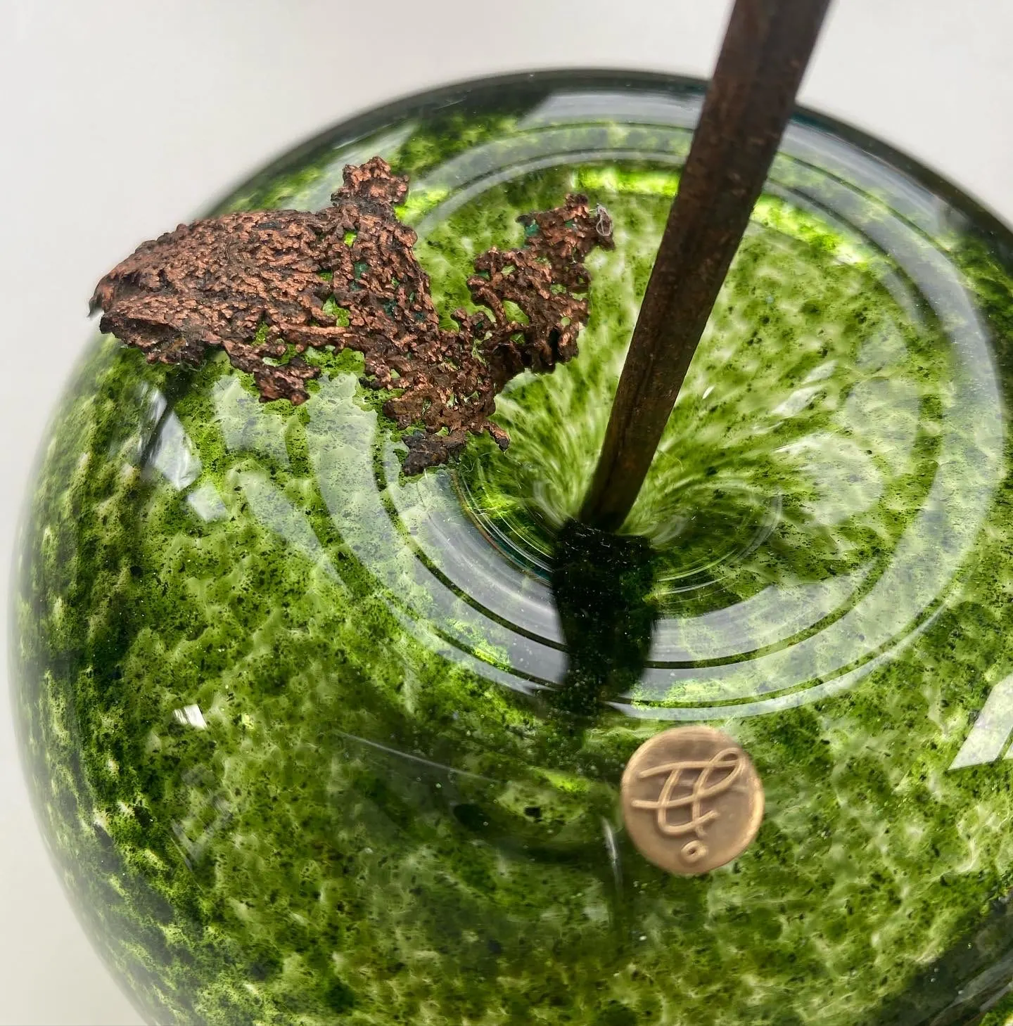 A Happy Apple glass sculpture
